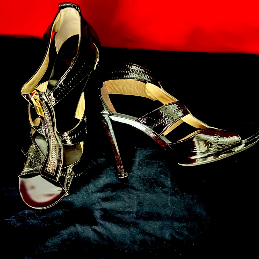 Michael Kors designer strapped heels.